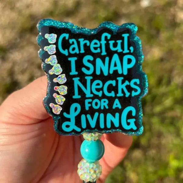Careful I Snap Necks for a Living Badge Reel