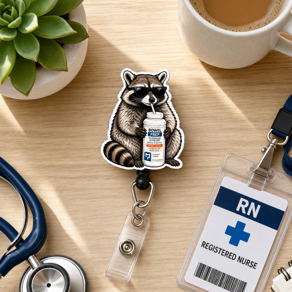 A nurse-themed retractable badge reel featuring a raccoon holding a medication bottle, shown on a light wood desk with a stethoscope, plant, coffee cup, and nurse ID badge.