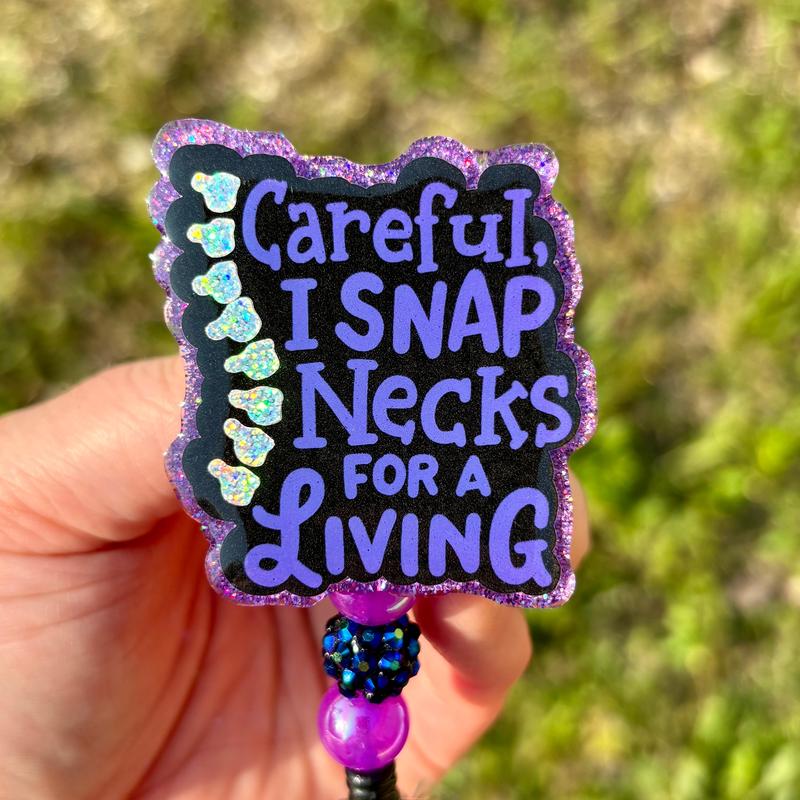 Careful I Snap Necks for a Living Badge Reel