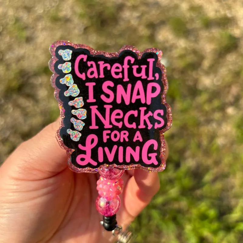Careful I Snap Necks for a Living Badge Reel