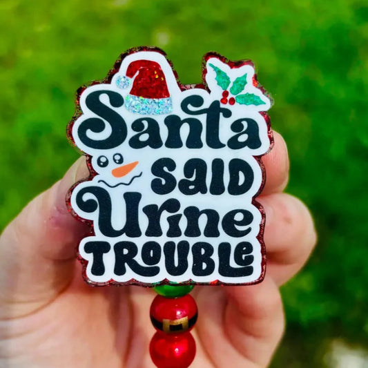 Santa said Urine Trouble Badge Reel