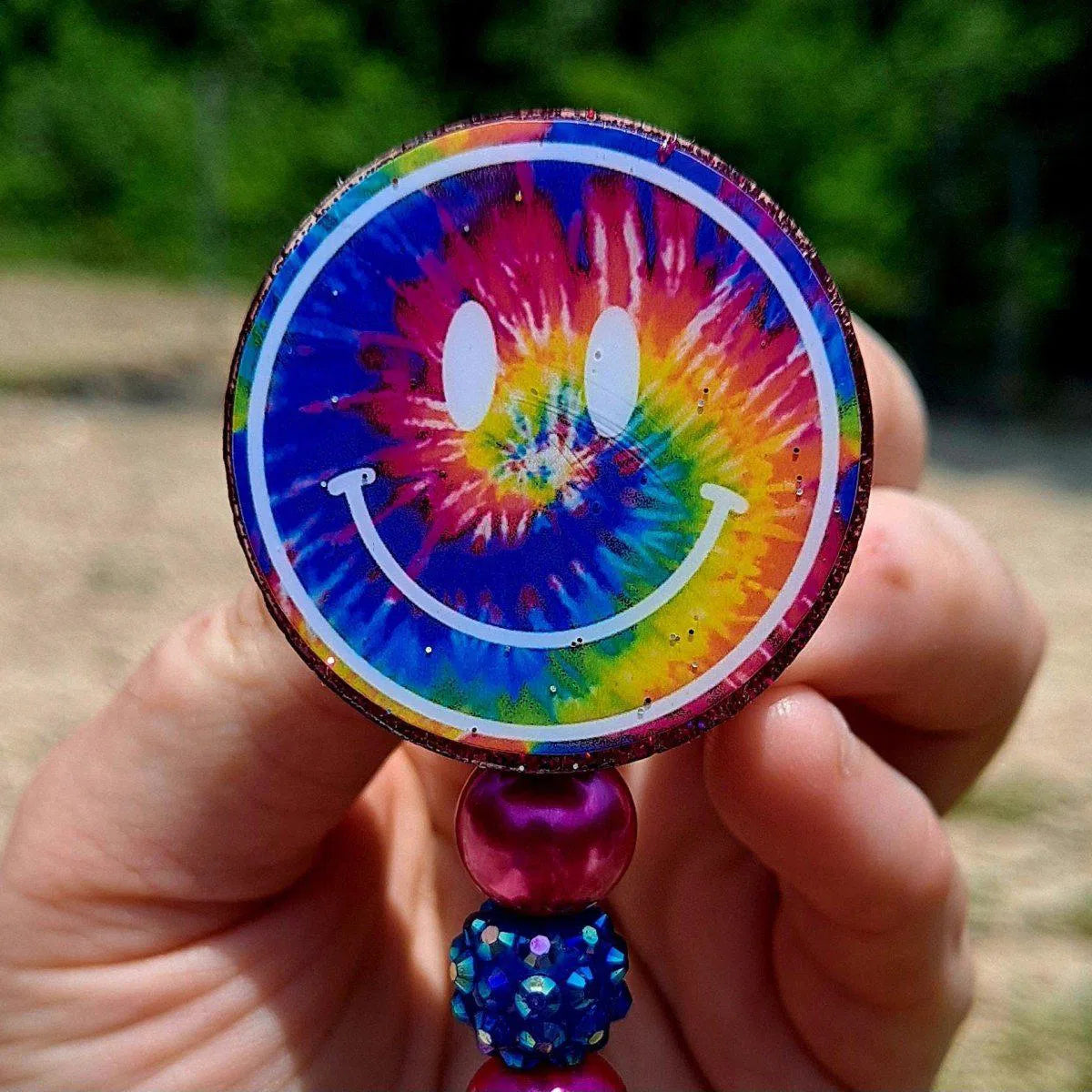 Smiley Face Tie Dye Badge Reel