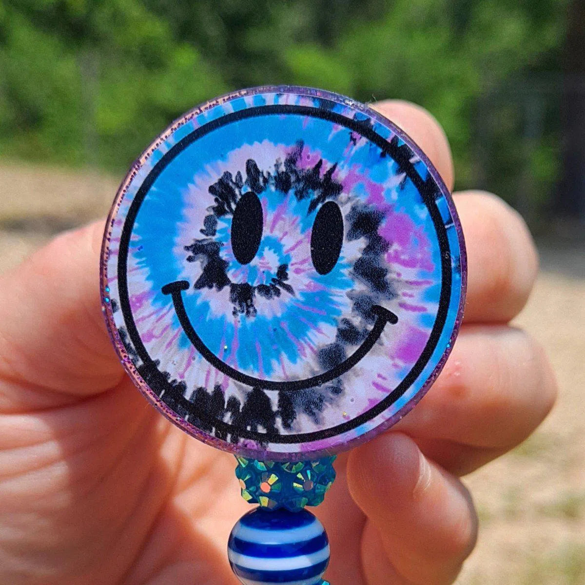 Smiley Face Tie Dye Badge Reel